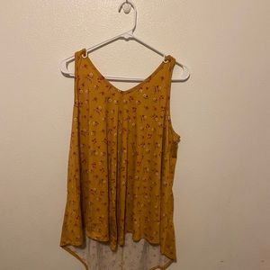 A Mustard Yellow Tank Top with Floral Pattern